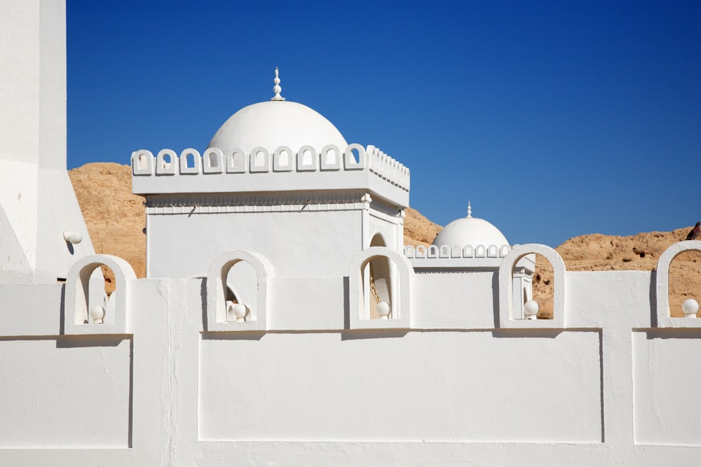 white concrete building under blue sky during daytime