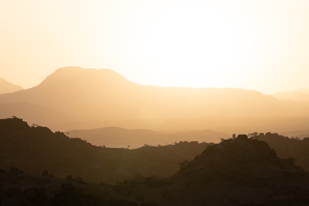 silhouette of mountains during daytime