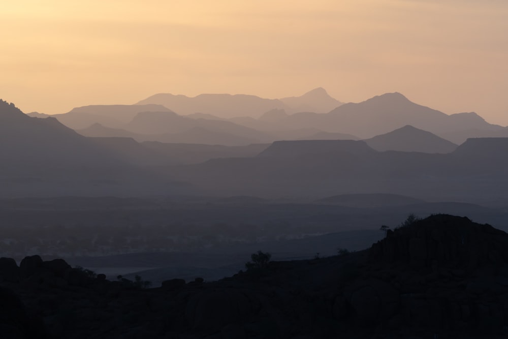 silhouette of mountains during sunset