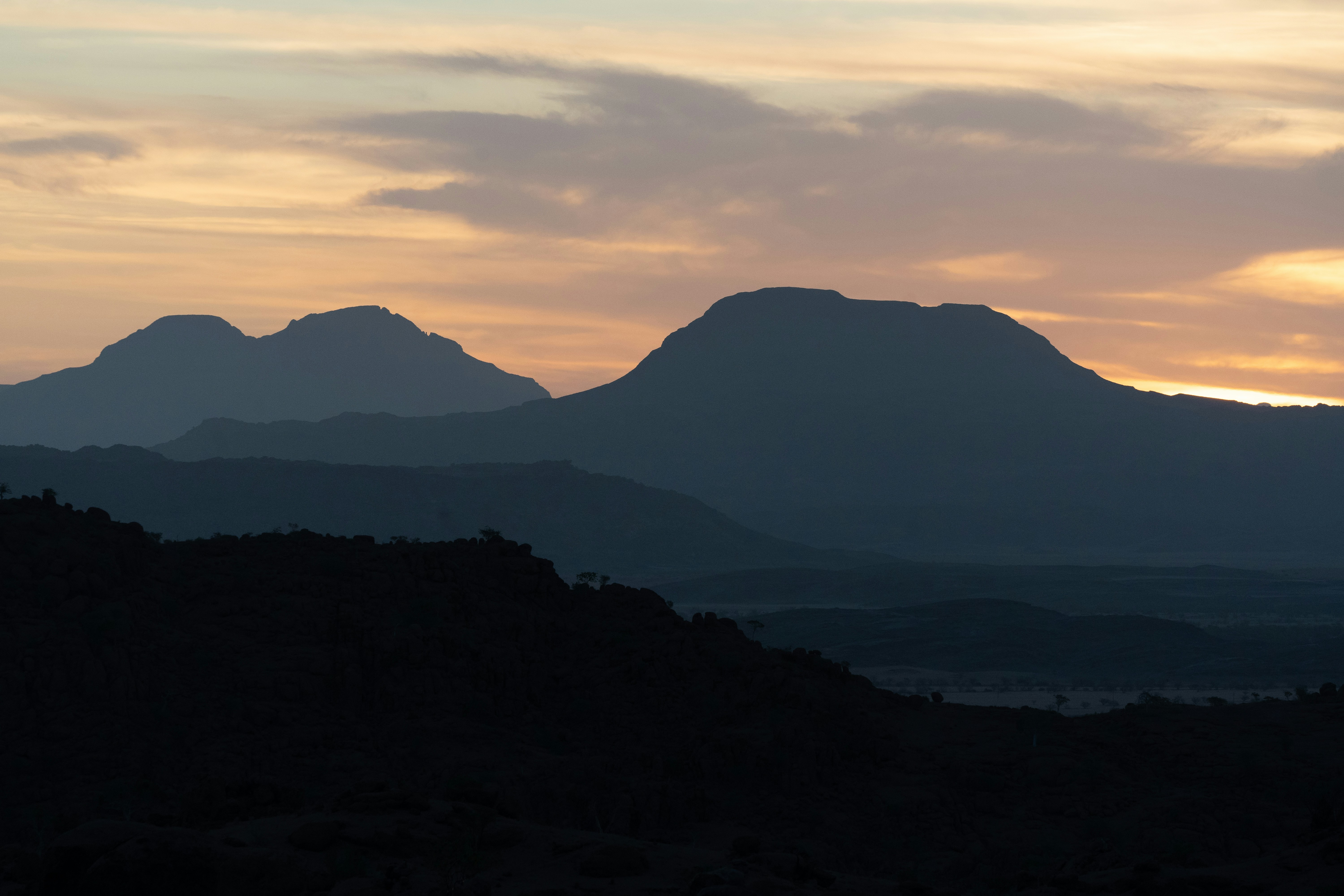 Sunset view over Damaraland, Namibia. There lies such beauty in these hazy, dusty days. February 2020.
