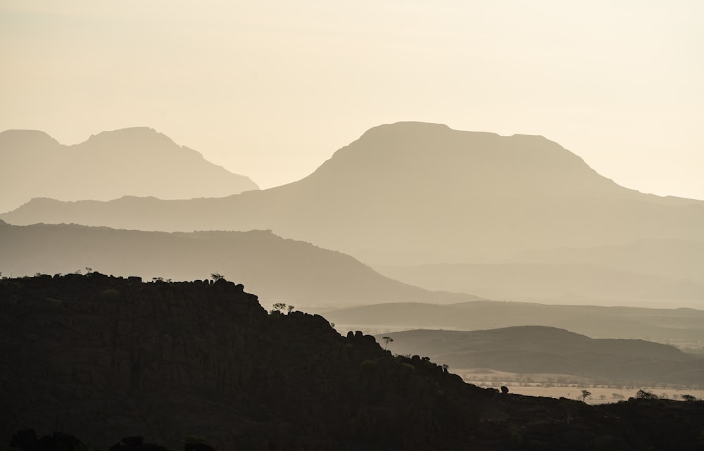 silhouette of mountain during sunset