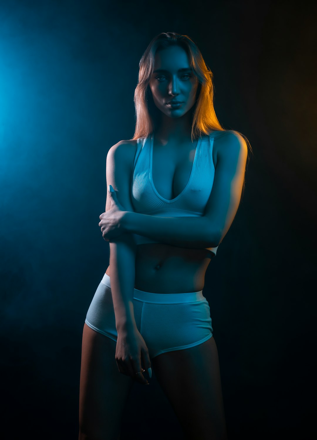 woman in blue sports bra and black shorts