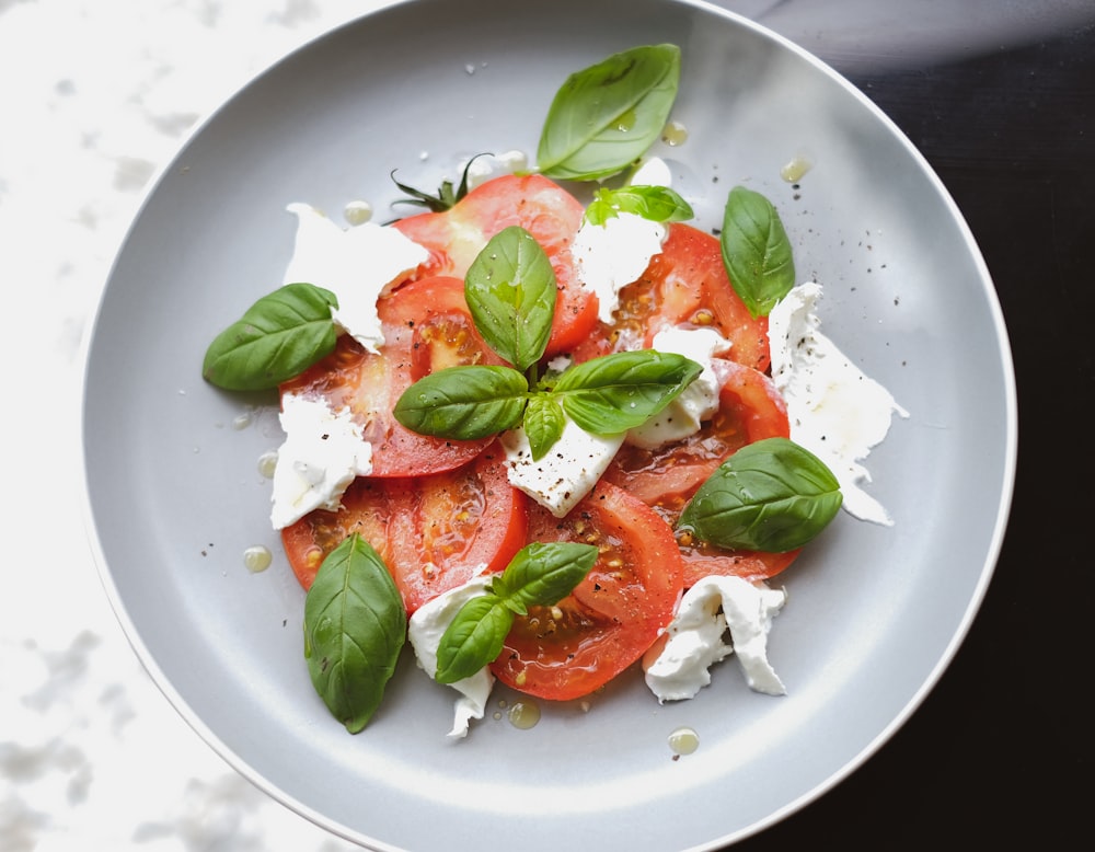 vegetable salad on white ceramic plate