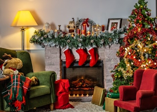 green sofa chair beside green christmas tree