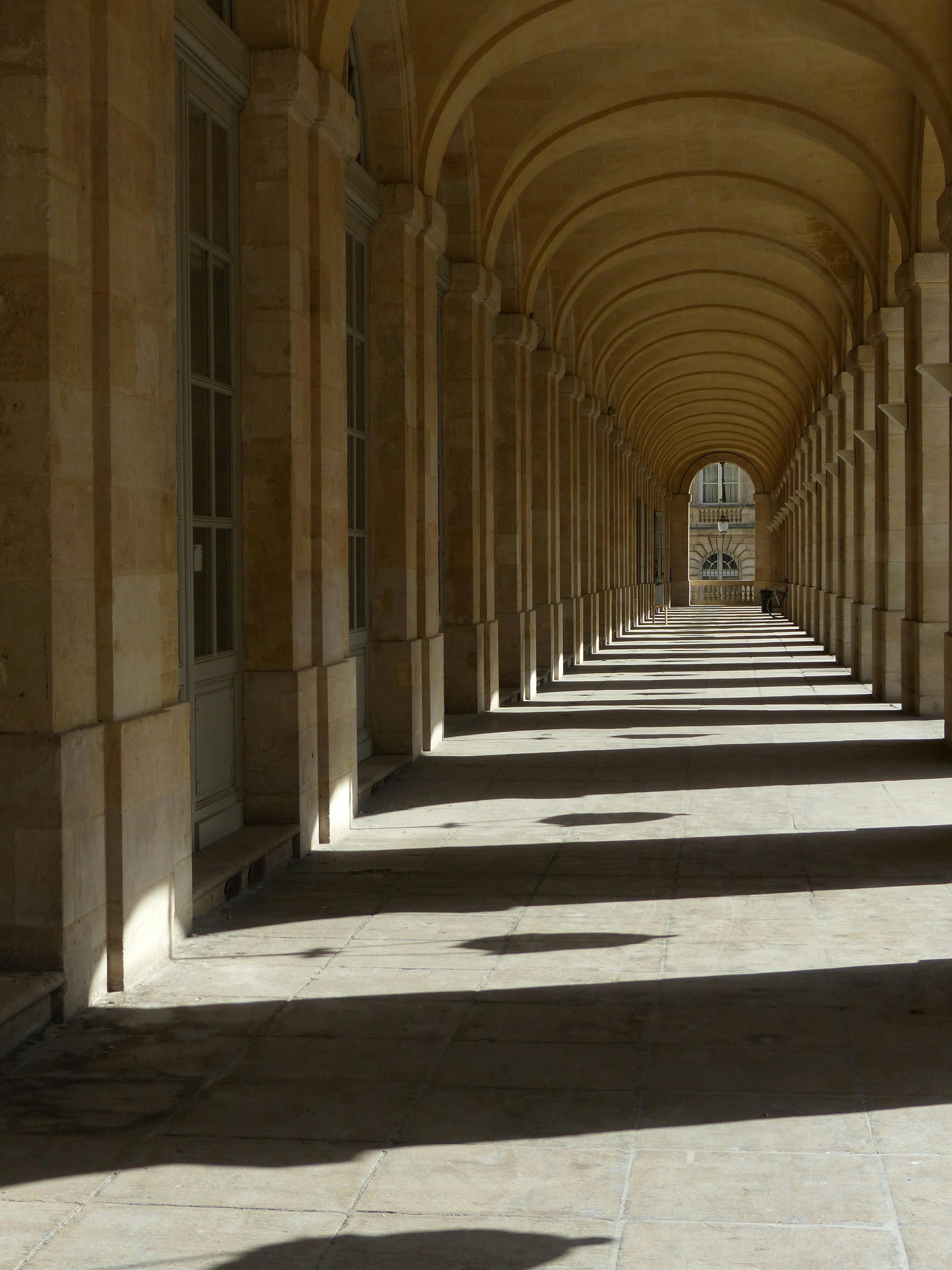 gray and white concrete hallway