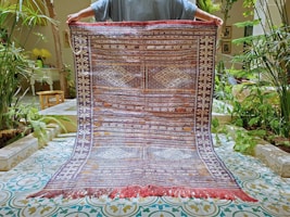red and white floral area rug