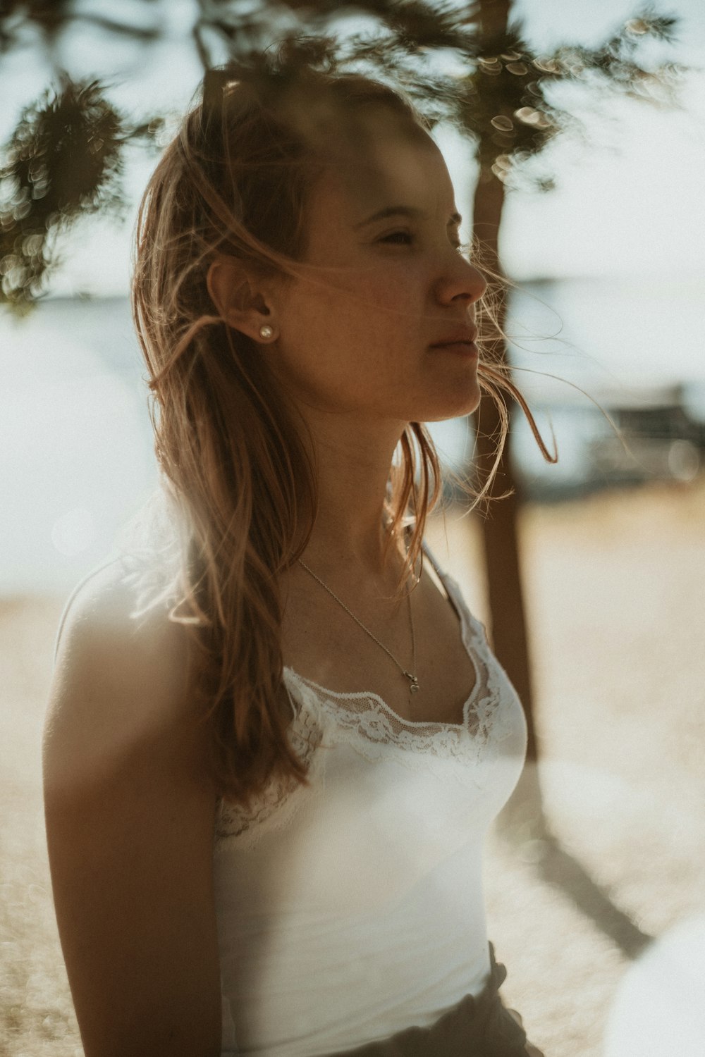 woman in white tank top