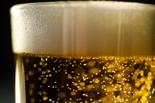 a close up of a glass of beer