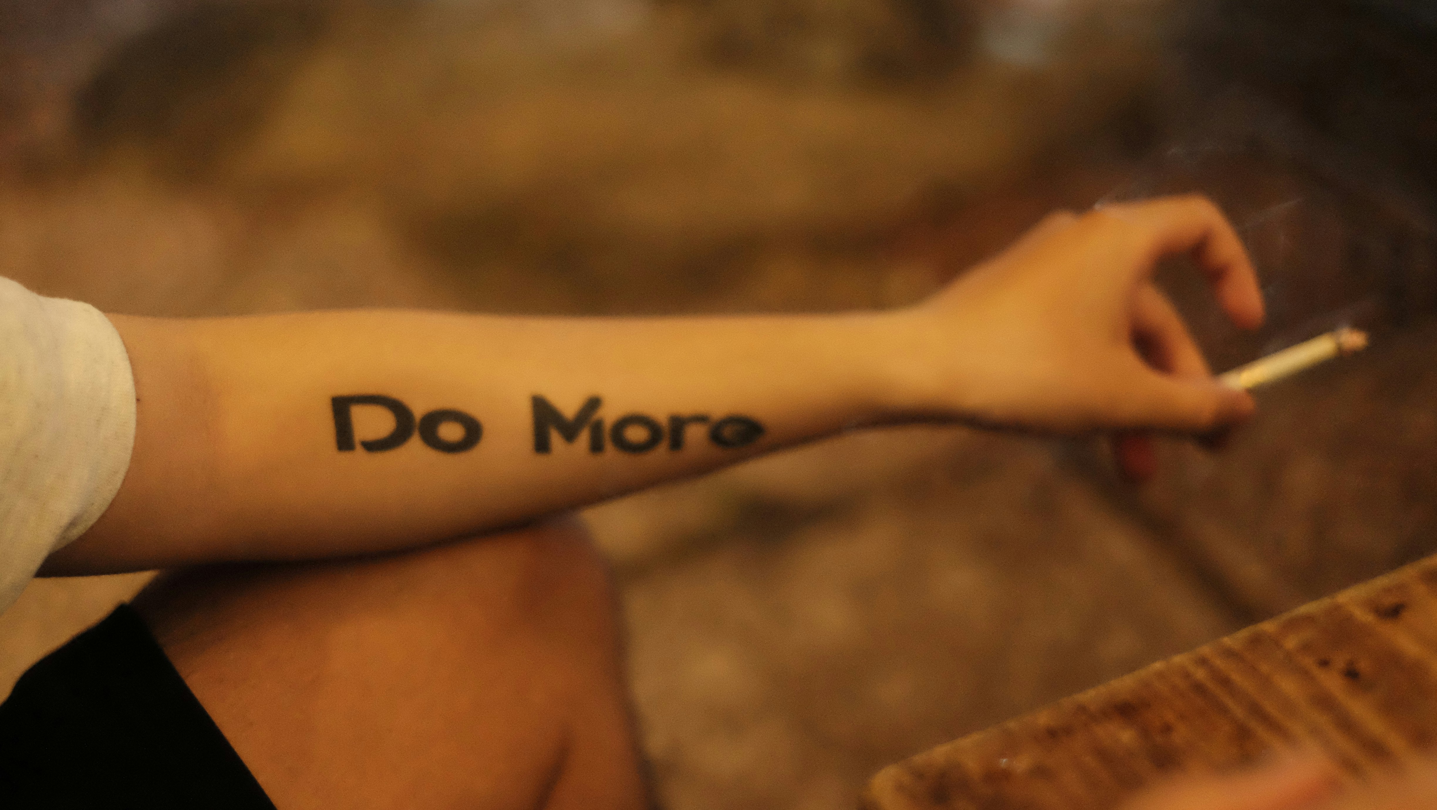 white and black labeled soft tube