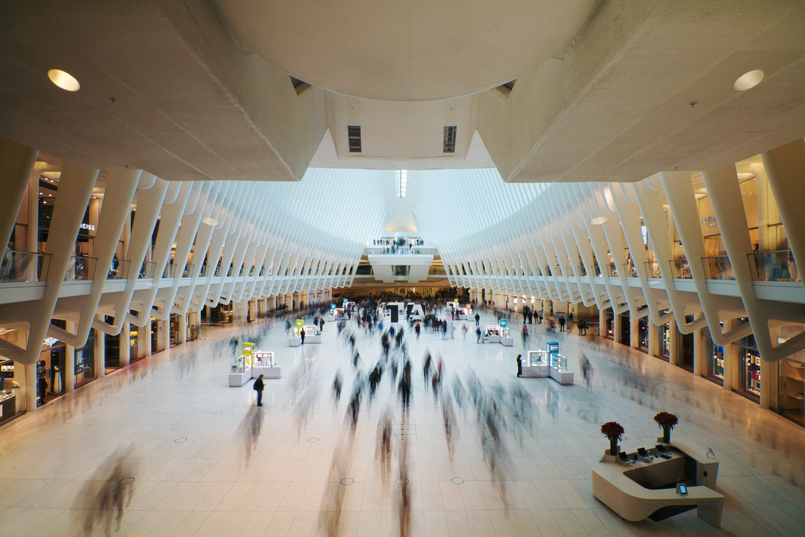 Canon EOS 70D + Tokina AT-X Pro 11-16mm F2.8 DX sample photo. People walking inside white photography