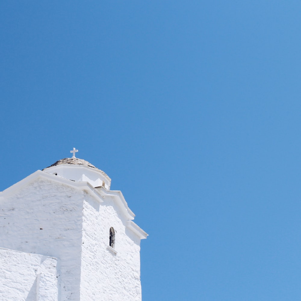 white concrete building under blue sky during daytime