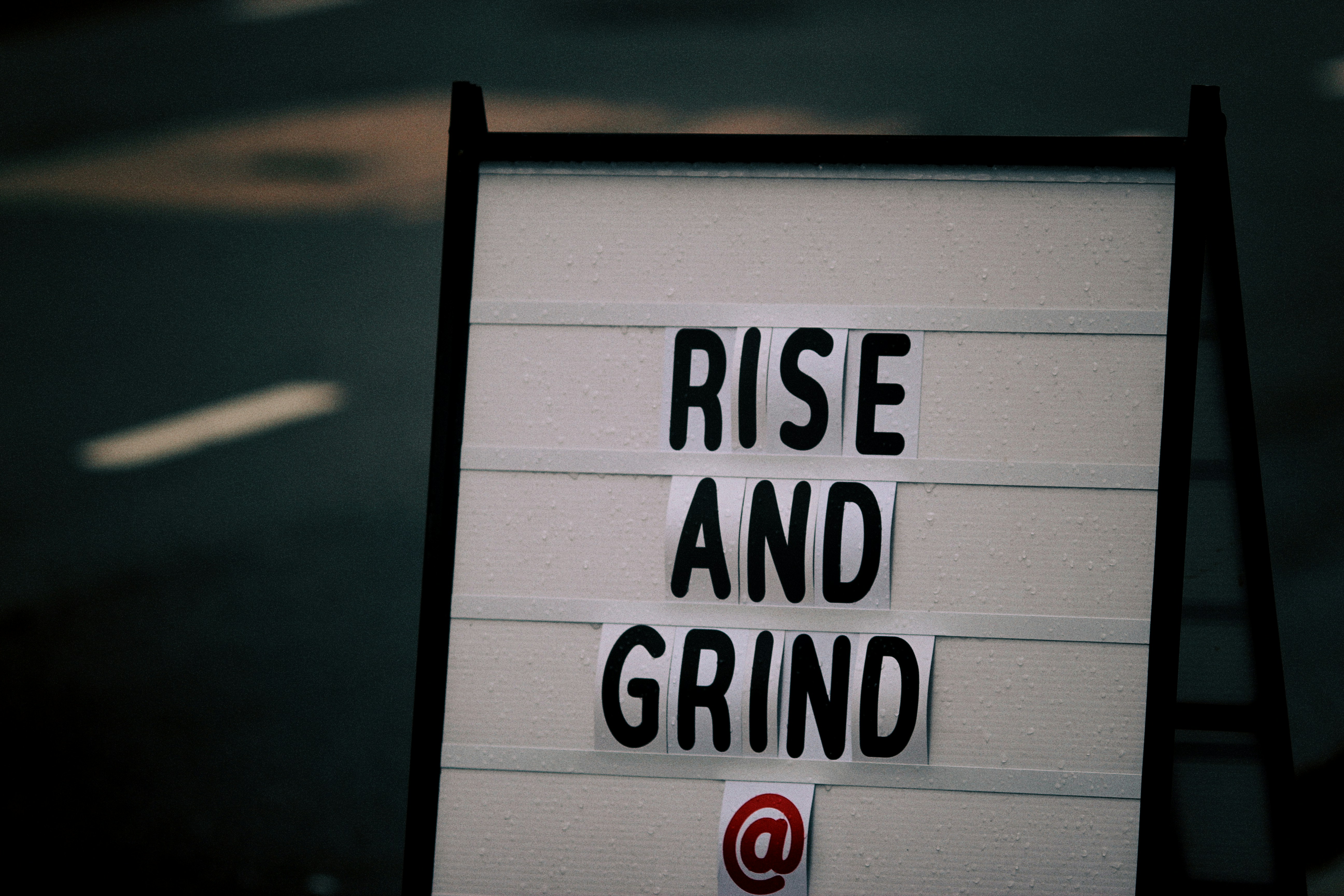 White and black wooden signage