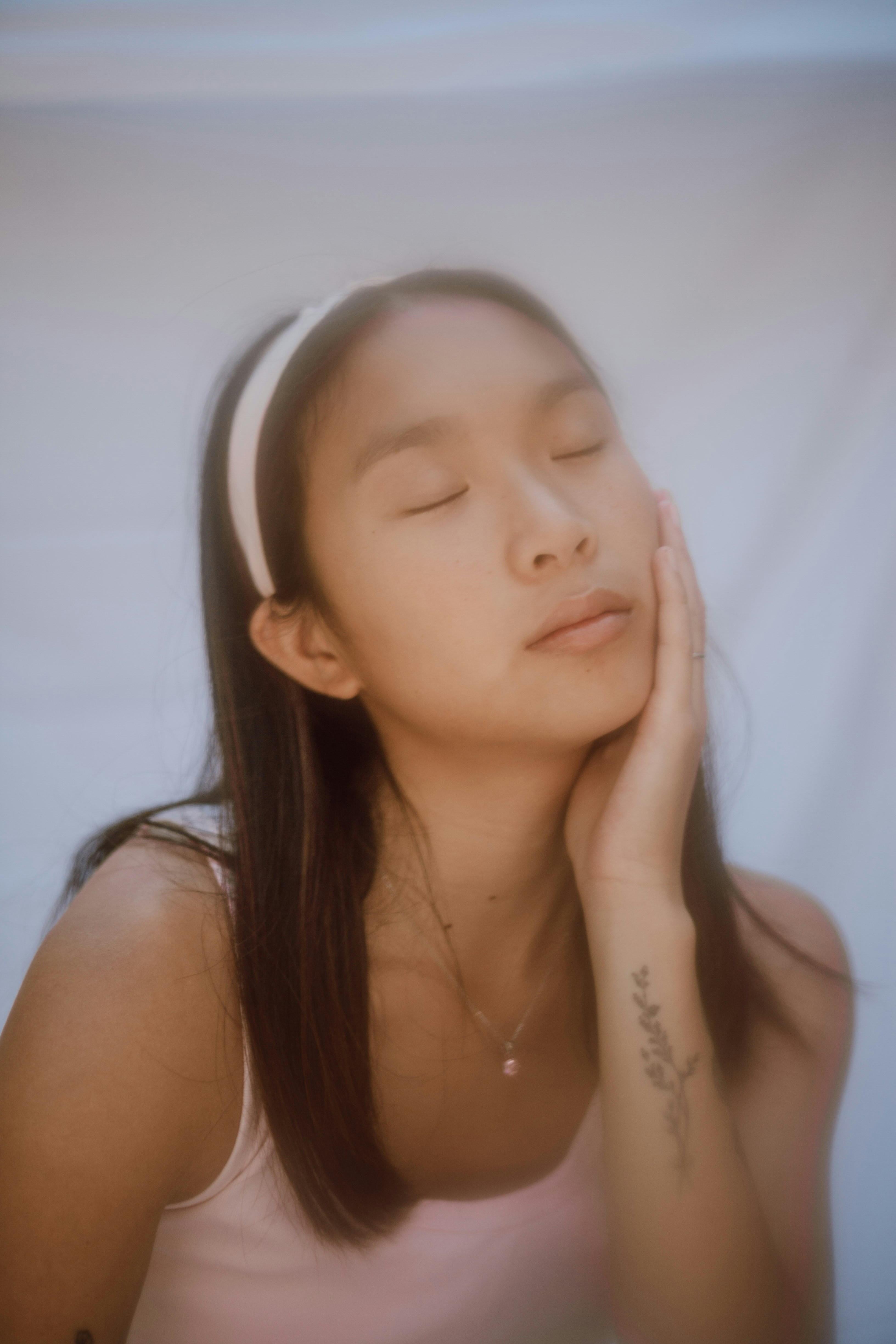 girl in white tank top