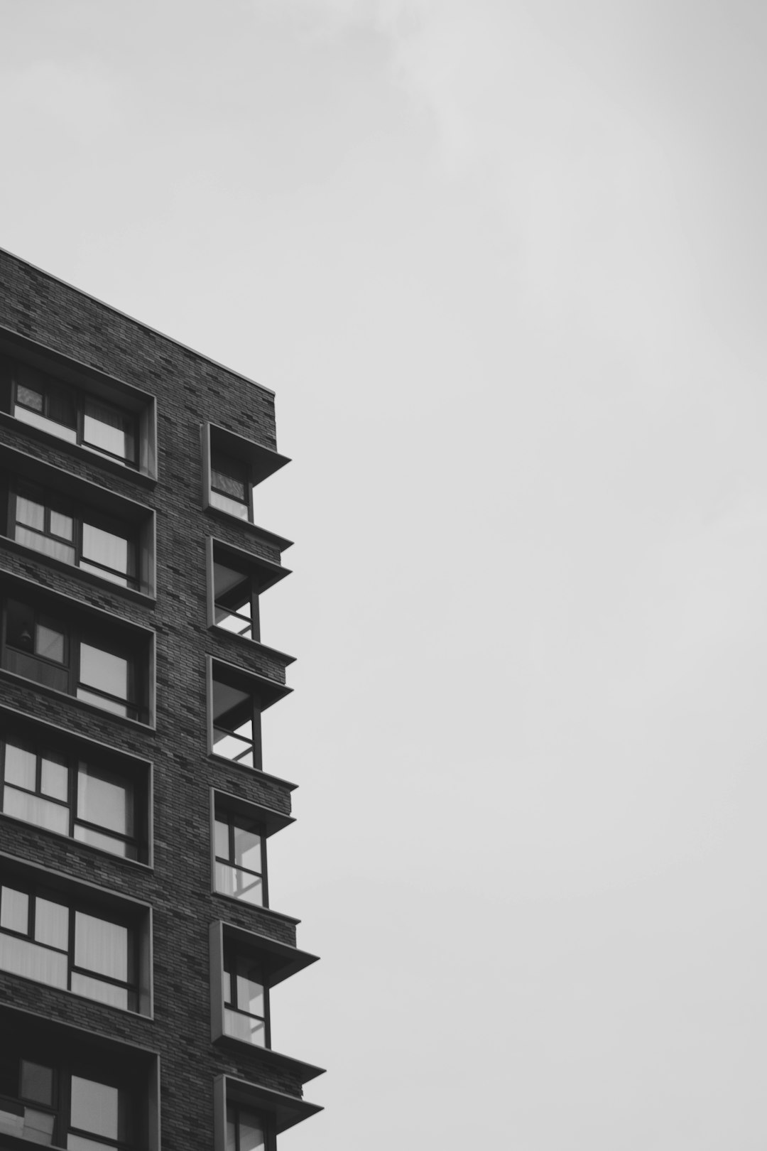 grayscale photo of concrete building