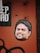 A sticker of a smiling man's face is placed on a textured, rusty orange surface. Above the sticker, part of a black and white printed text is visible, with the letters 'EP DAD'. The background has a rough, industrial look with visible bolt holes and faded black paint strokes across the bottom left corner.