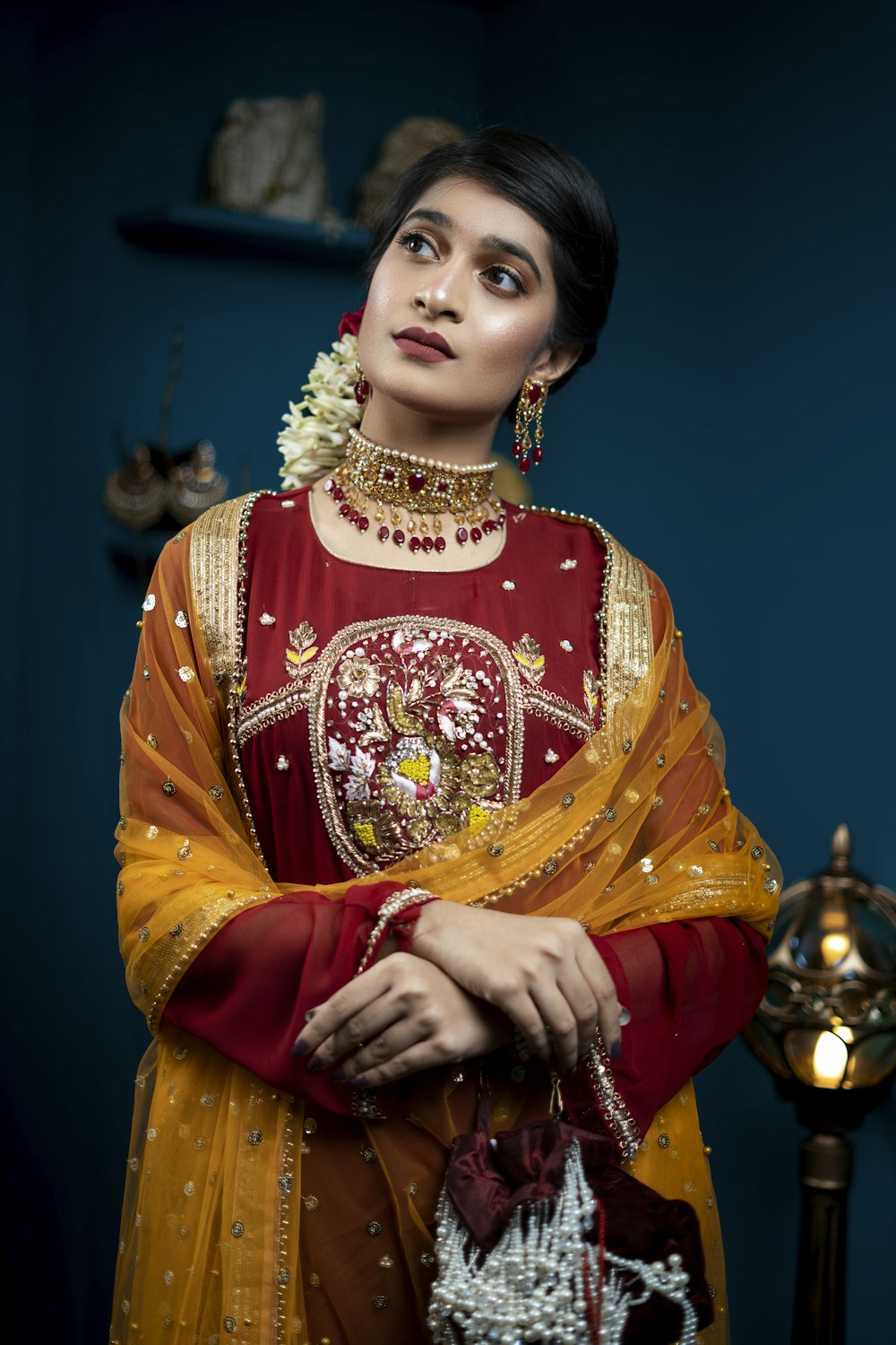 woman in yellow and red sari dress