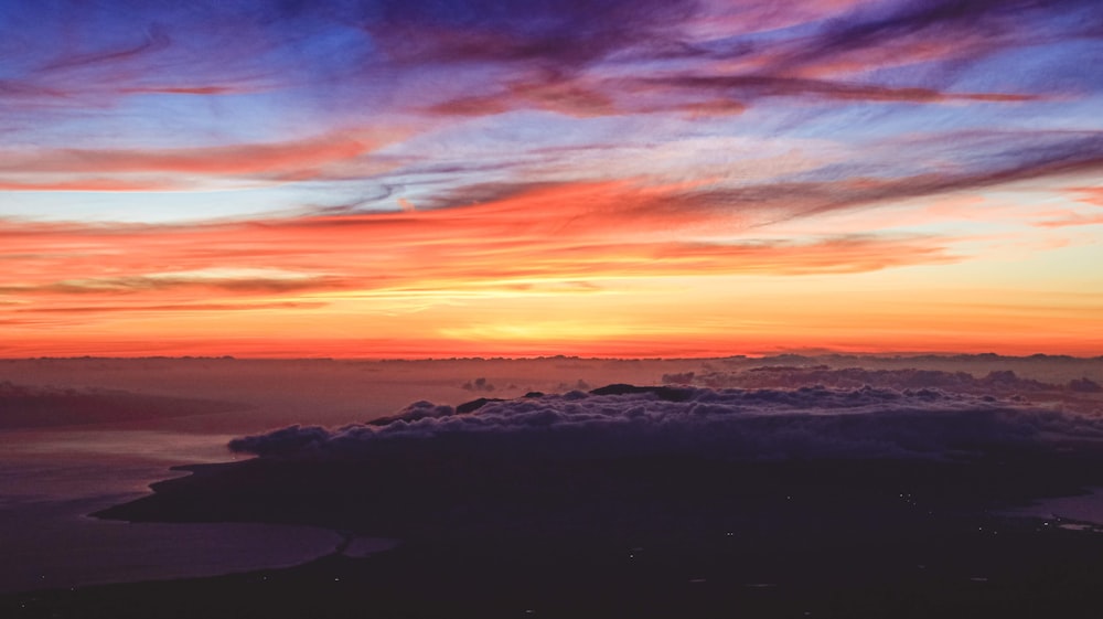 silhouette of mountains during sunset