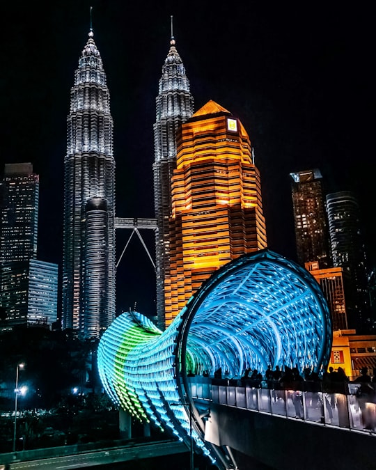 lighted city buildings during night time in KLCC Park Malaysia