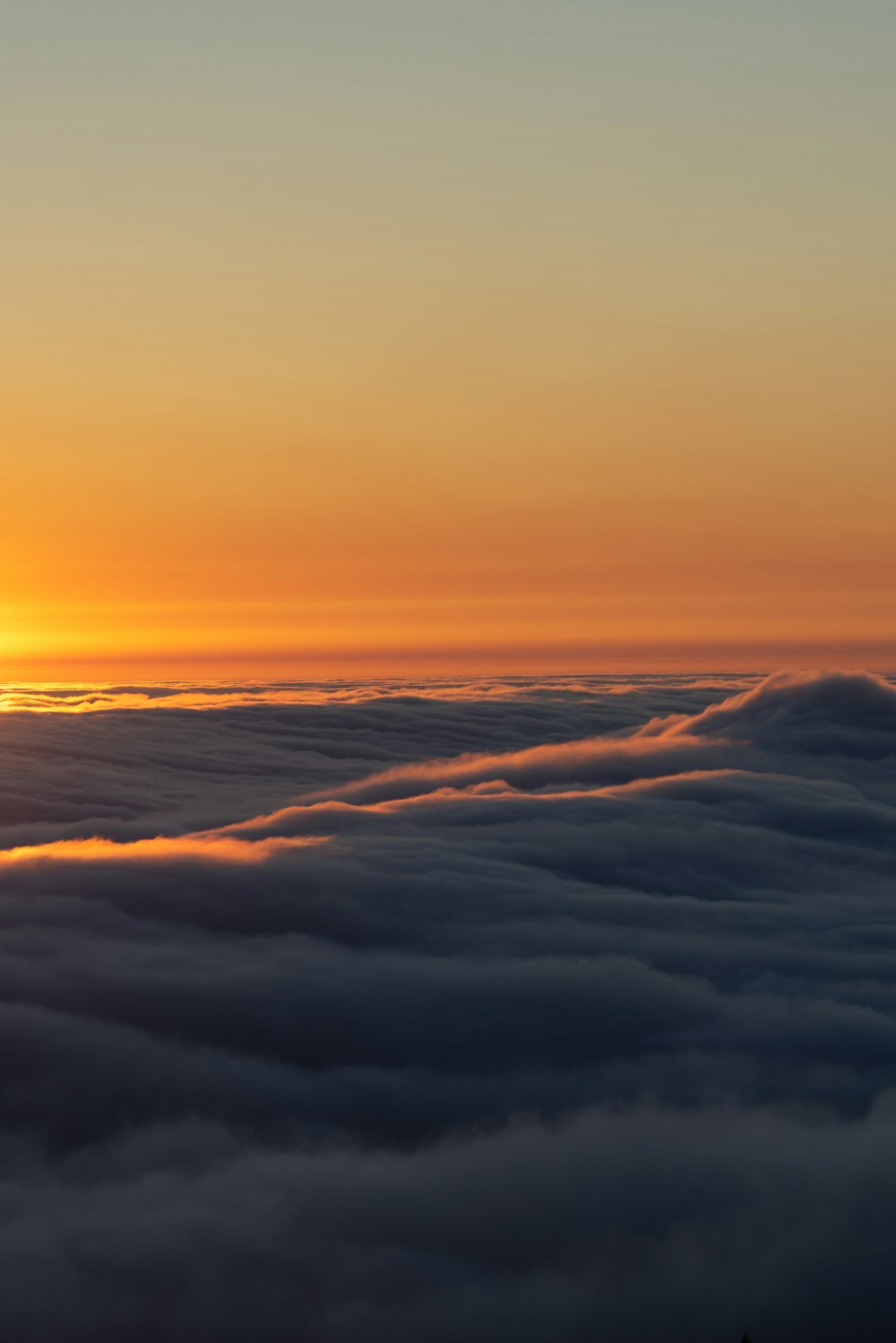 white clouds during golden hour