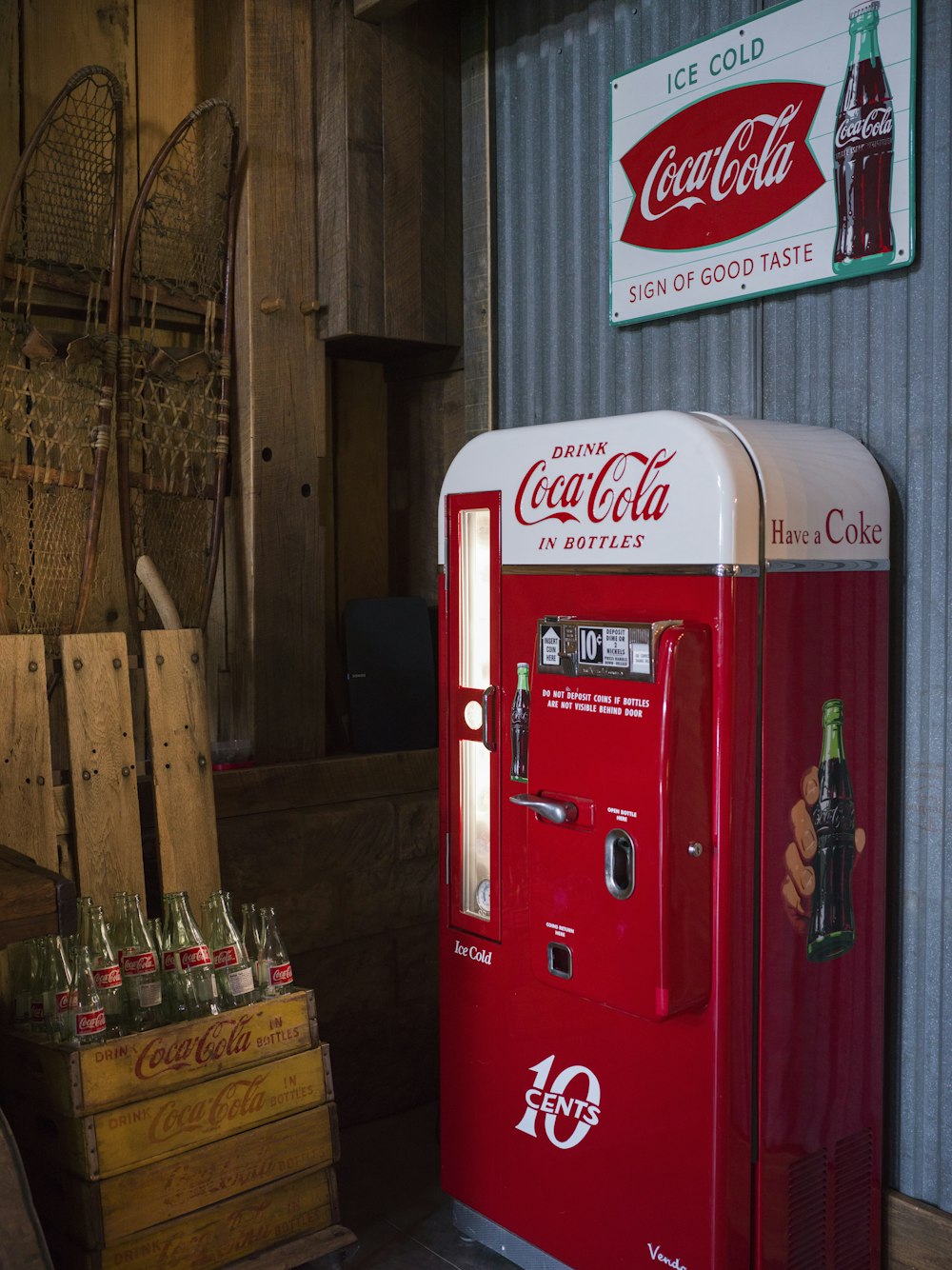red and white coca cola vending machine