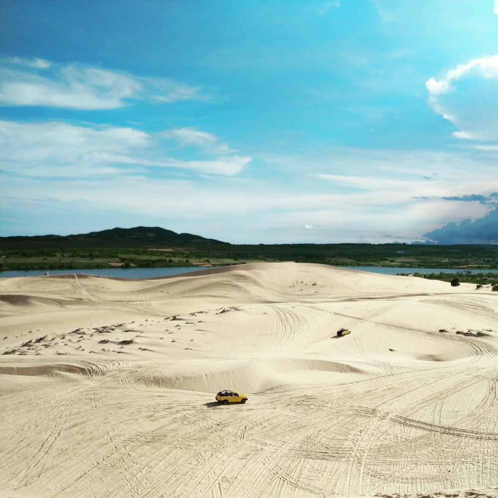 brown sand under blue sky during daytime