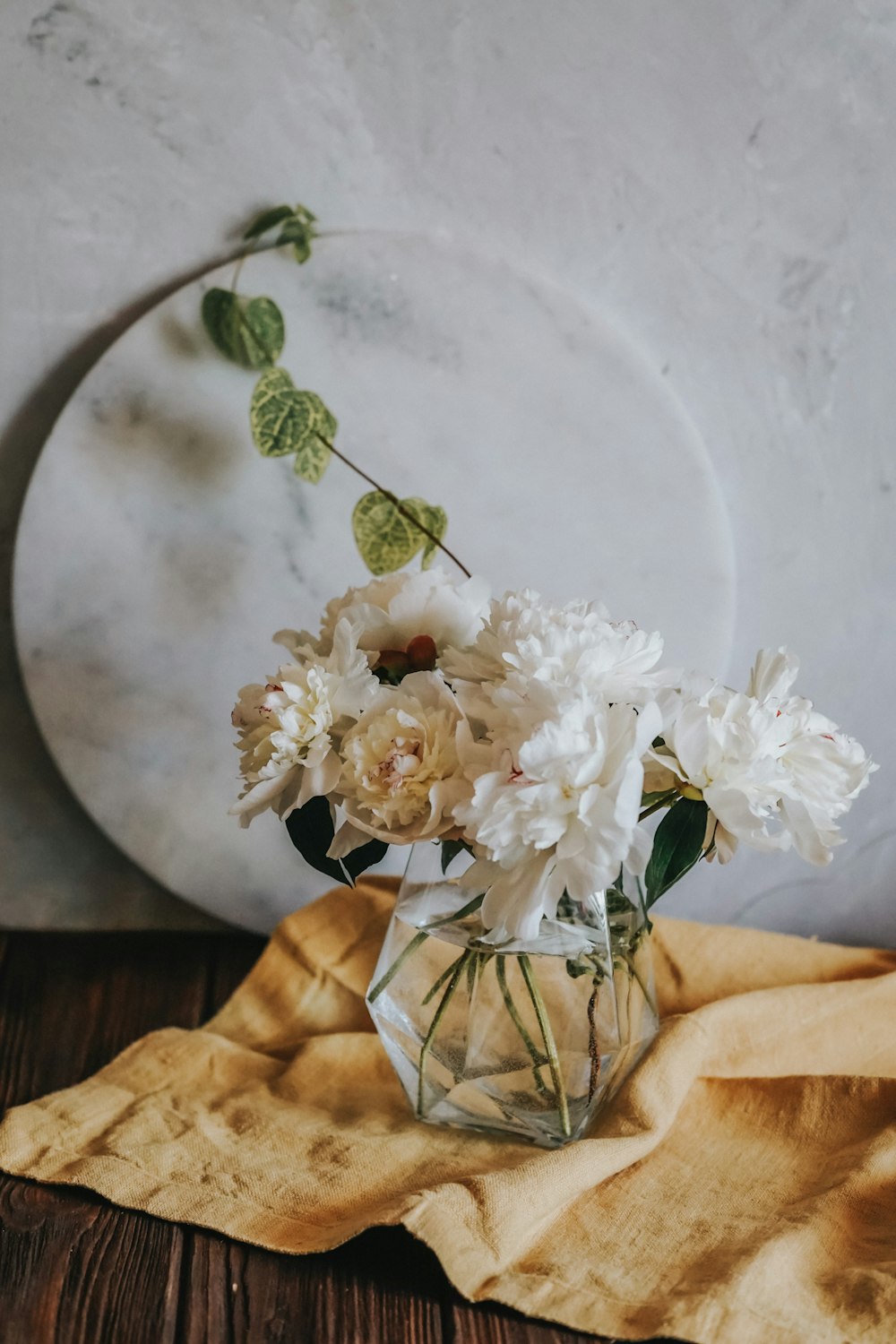 white flowers on white ceramic plate