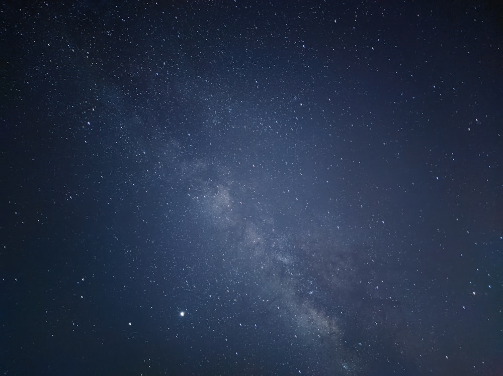 blue sky with stars during night time