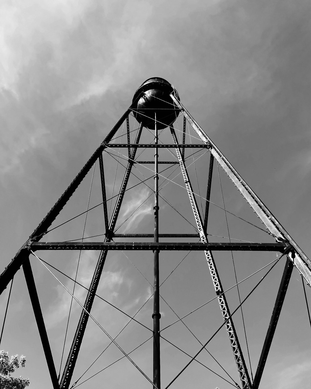 grayscale photo of metal tower