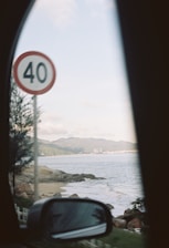 A scenic view of a rental car on a Croatian coastline.