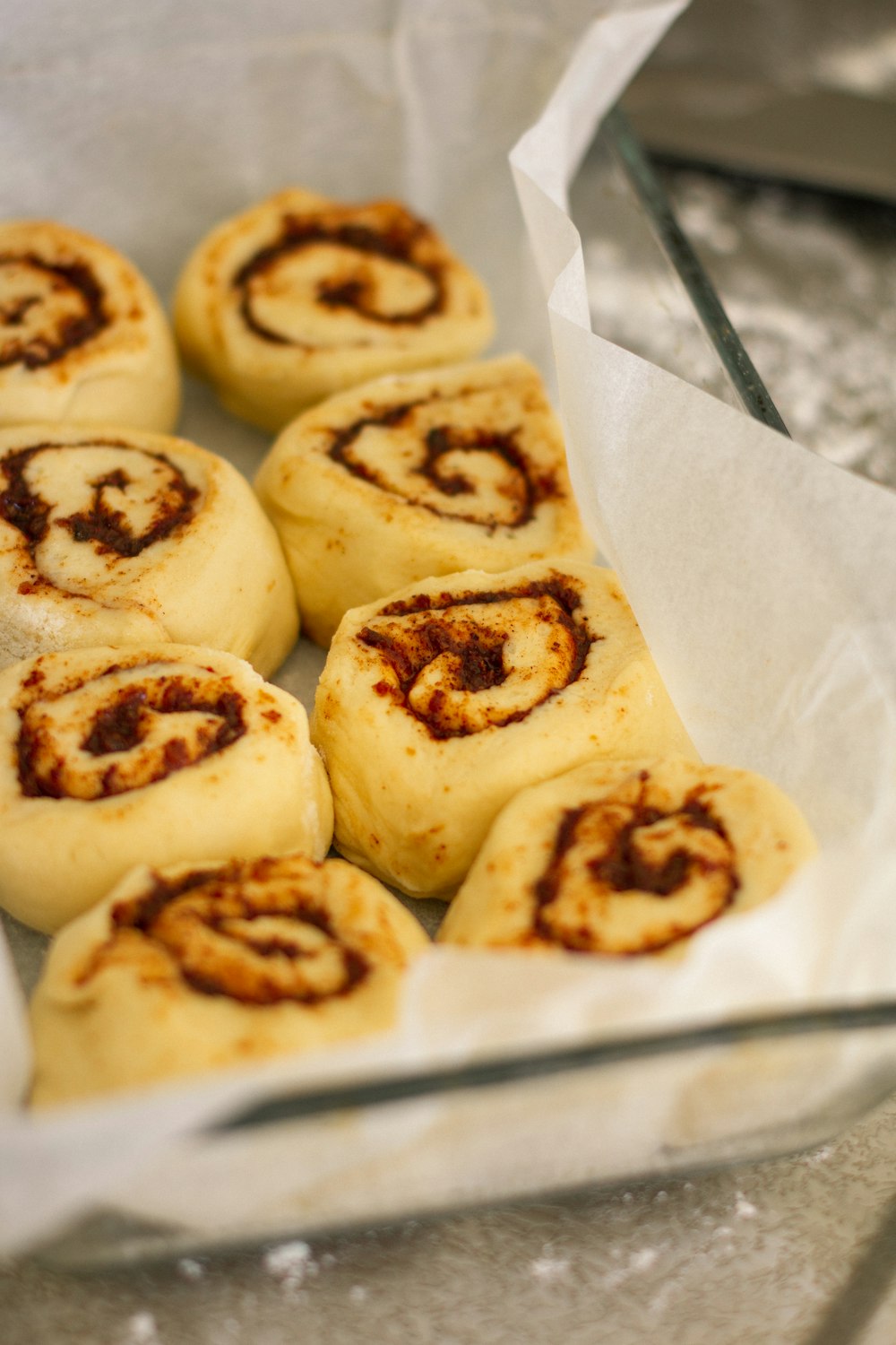 brown and white bread on white paper