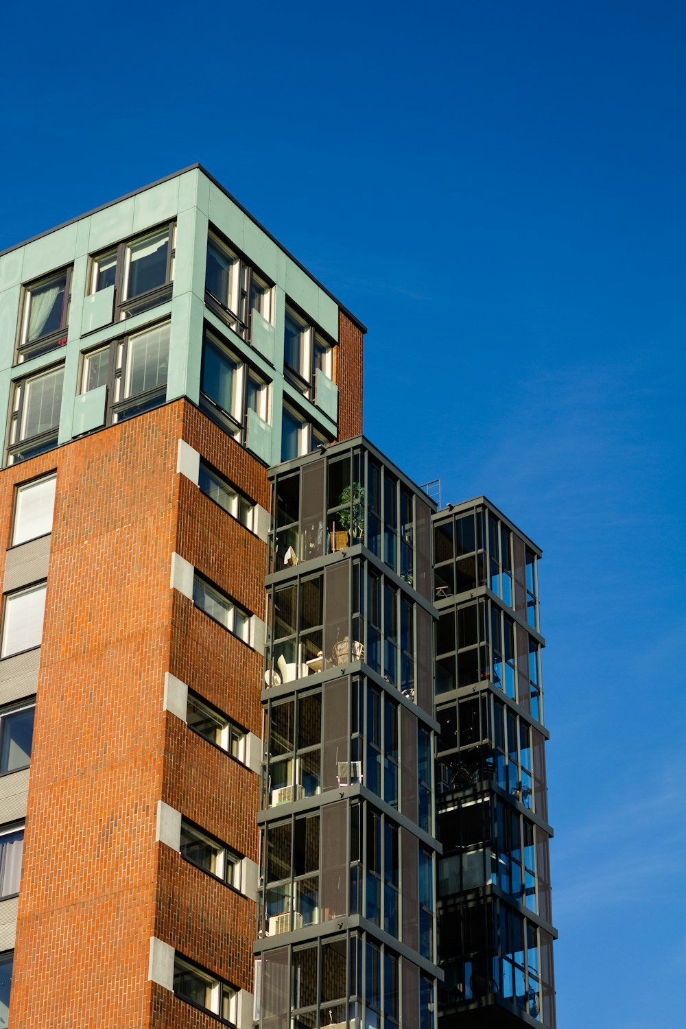 brown and white concrete building under blue sky during daytime