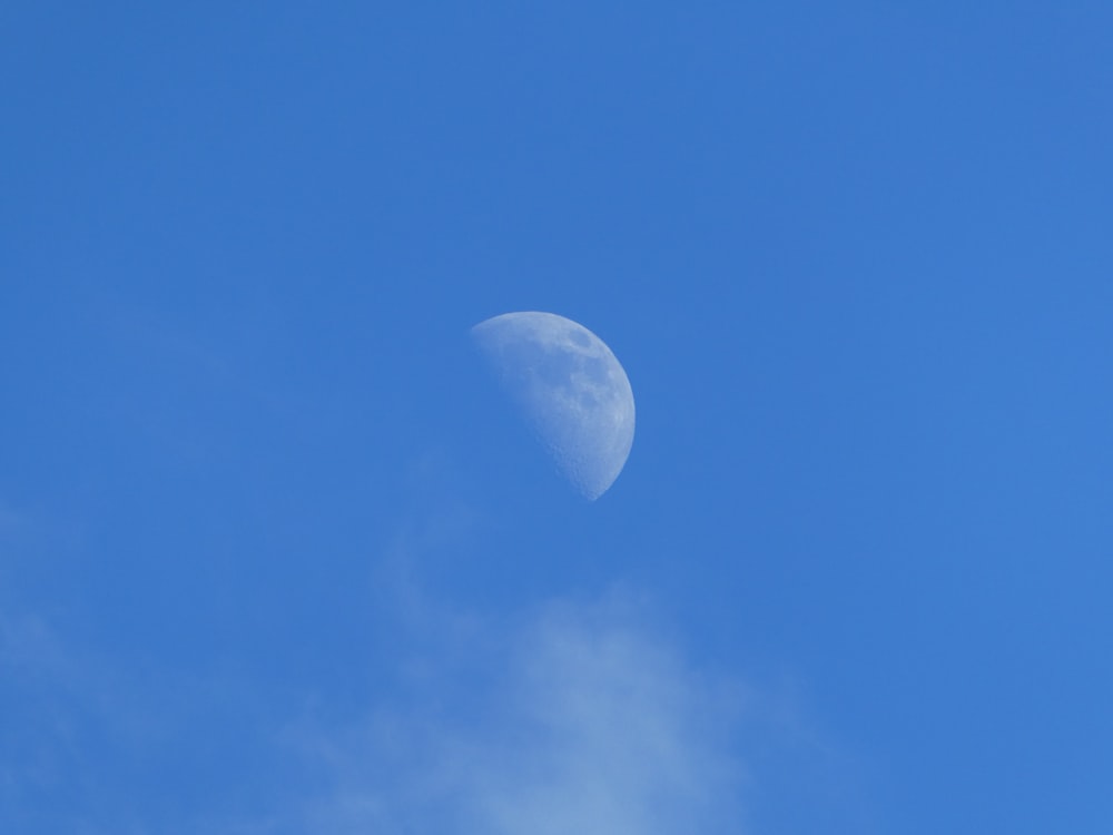 full moon in blue sky