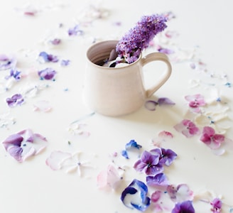 purple flower on white ceramic mug