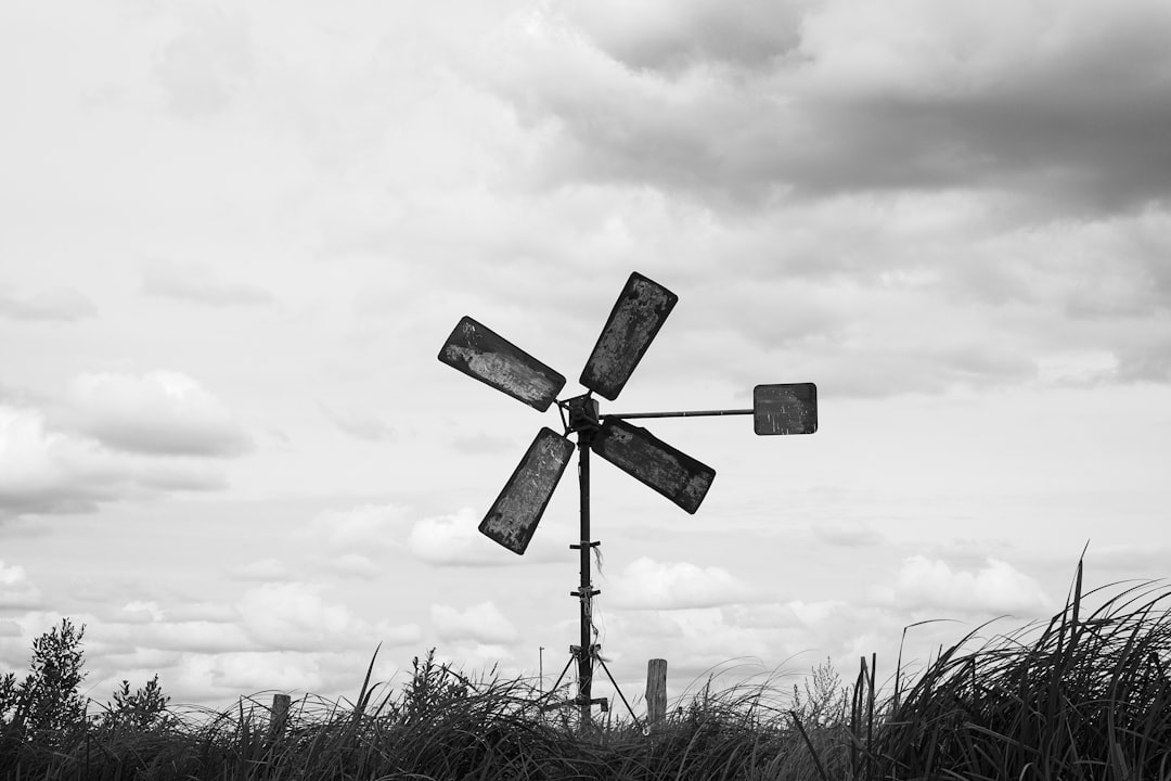 grayscale photo of black and white cross signage