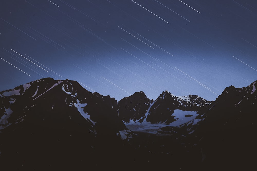 snow covered mountain during daytime