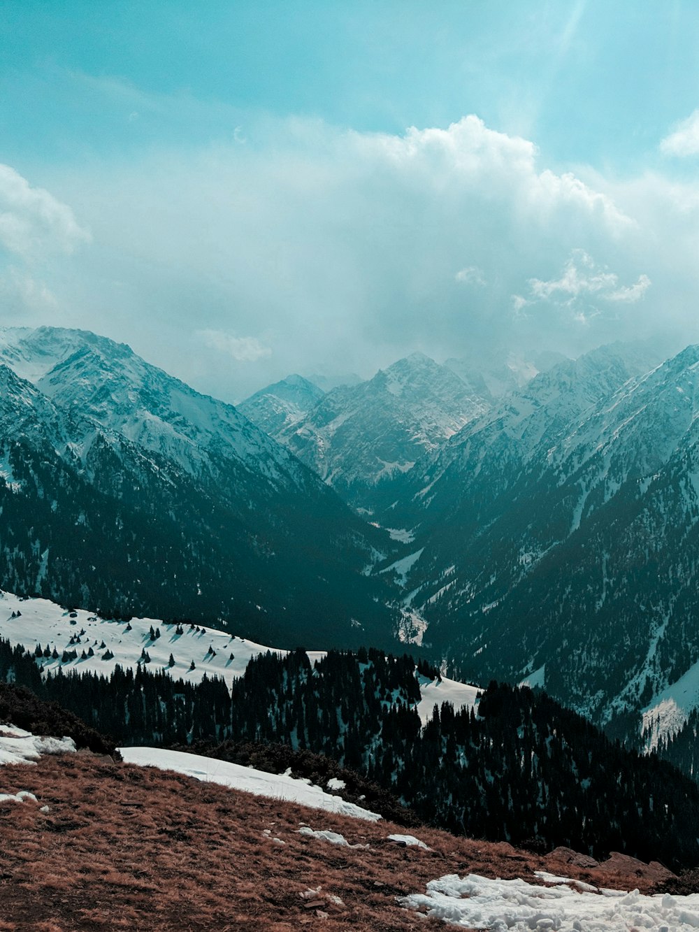 snow covered mountains during daytime