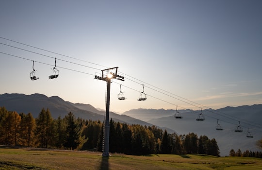cable cars over the mountains during daytime in Les Arcs France