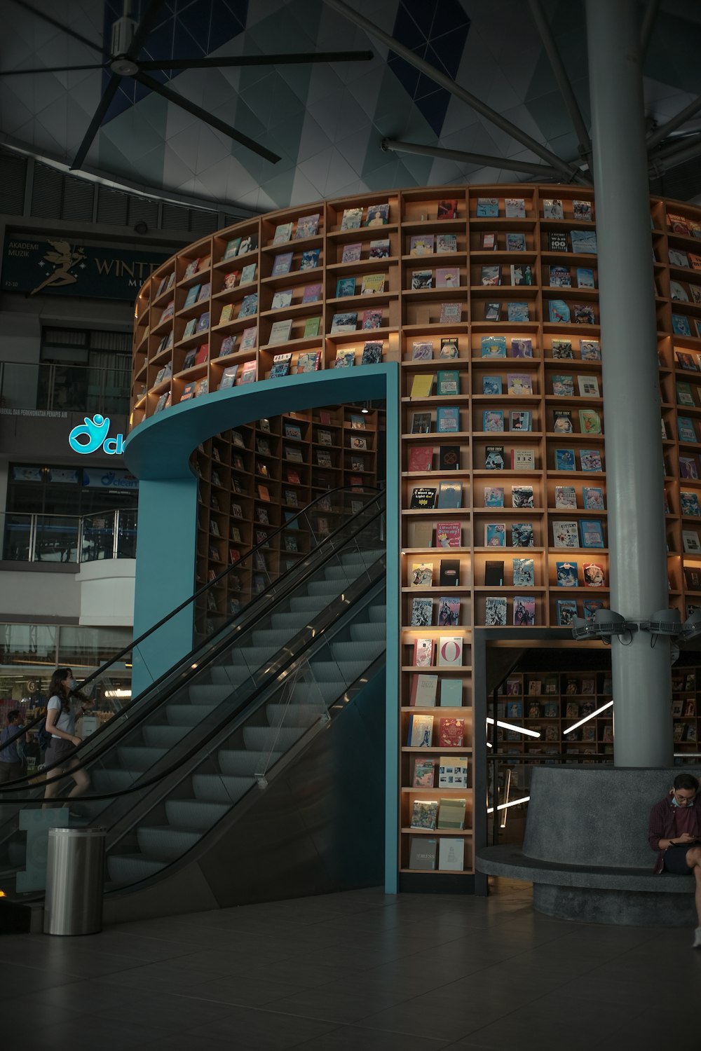 people walking on stairs inside building