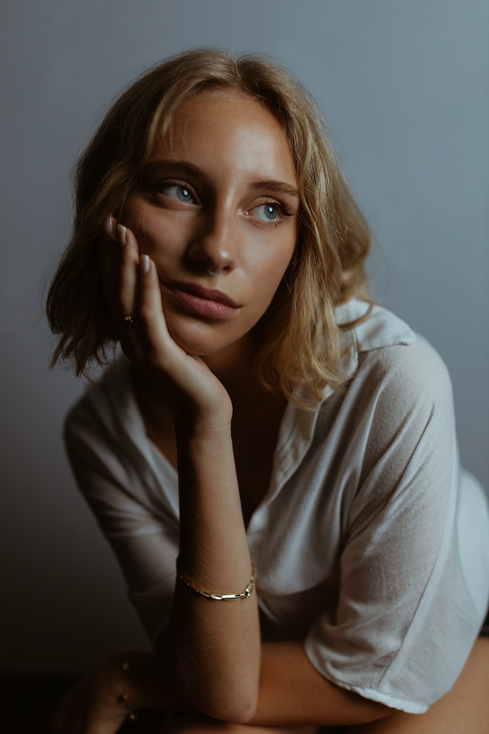 woman in white long sleeve shirt