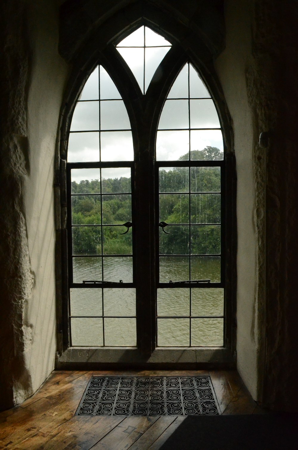 brown wooden framed glass window