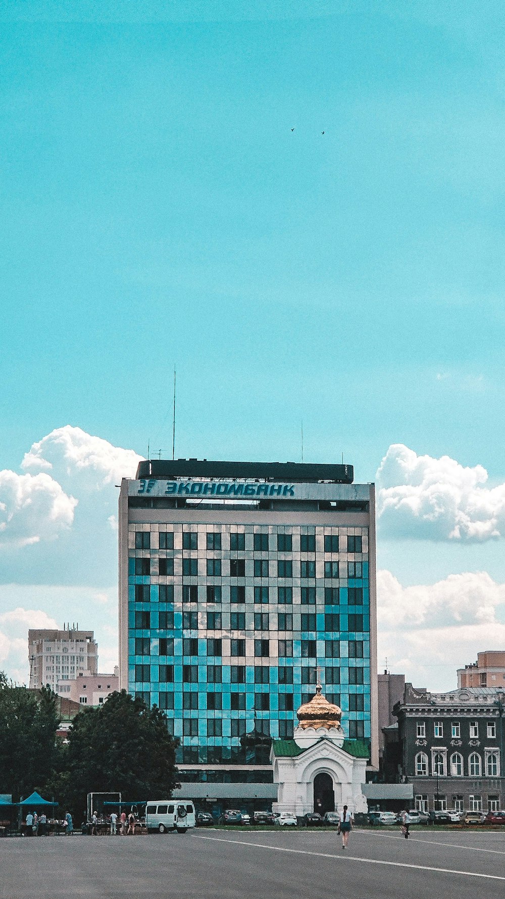 brown and white concrete building under blue sky during daytime