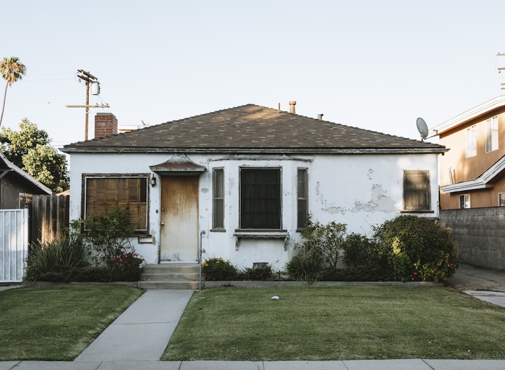 white and brown concrete house