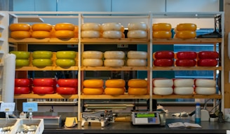 a store filled with lots of different types of cheese