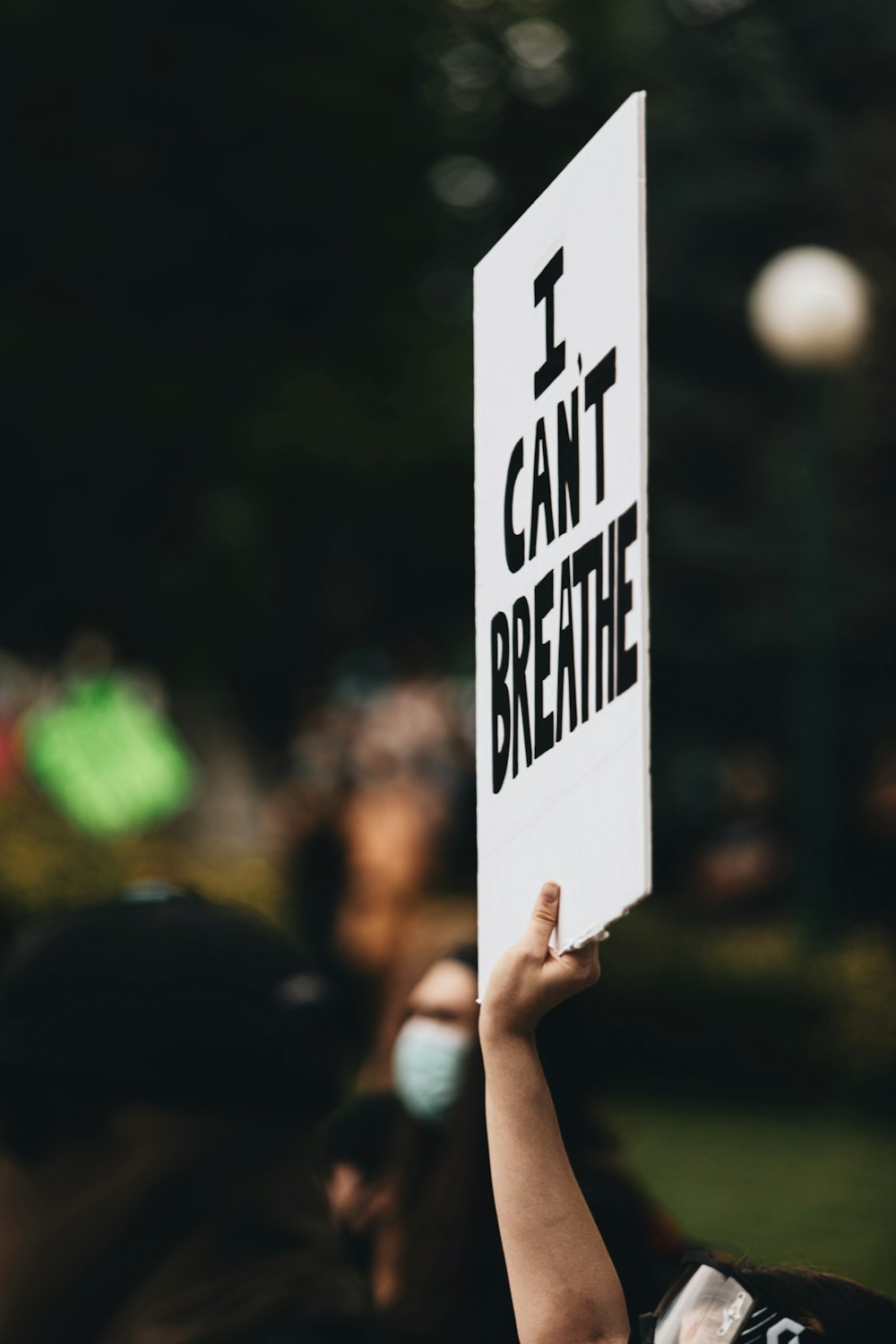 a person holding a sign