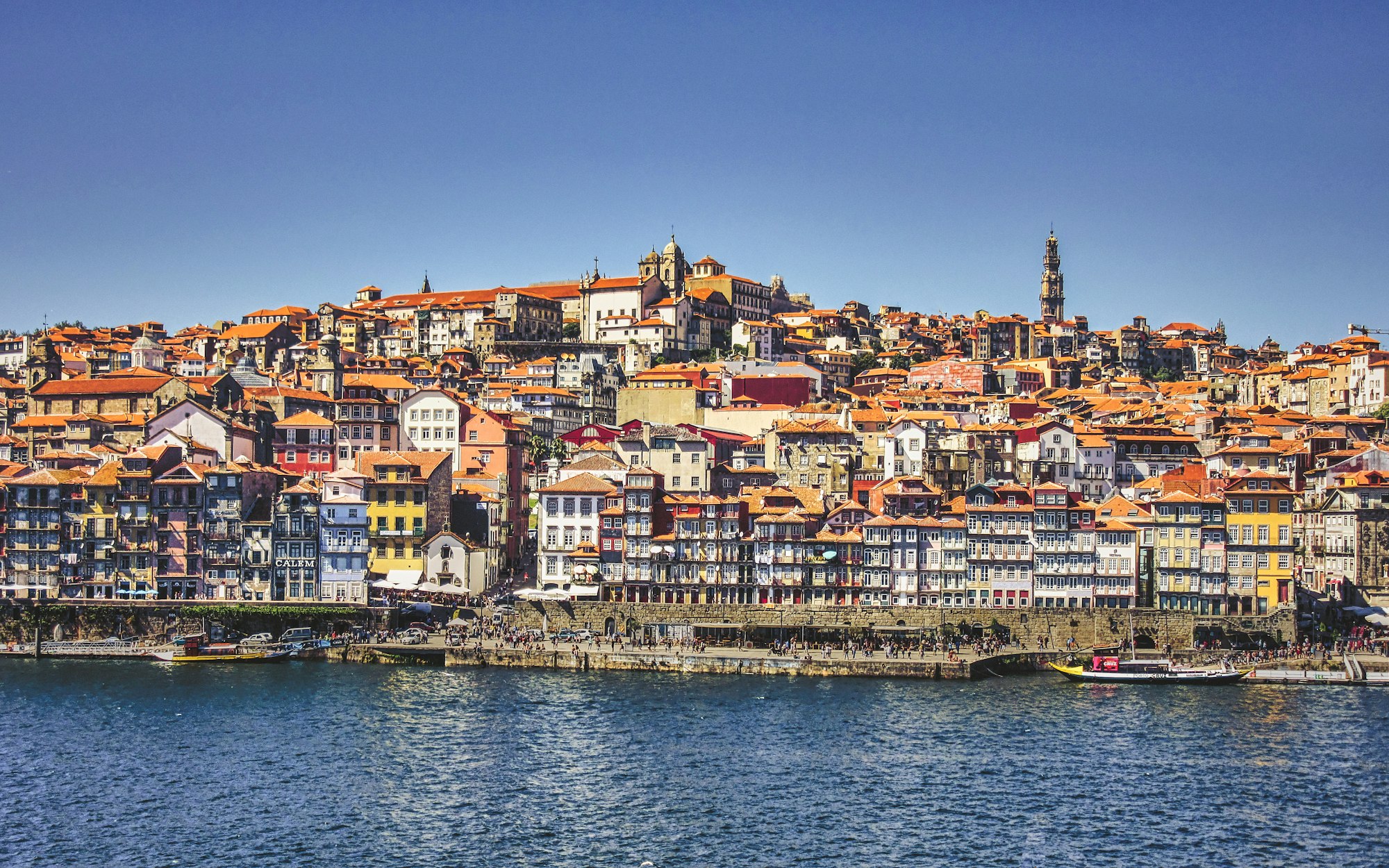 The hot summer sun bears down on the stacked houses in Porto, Portugal (Jun., 2016).