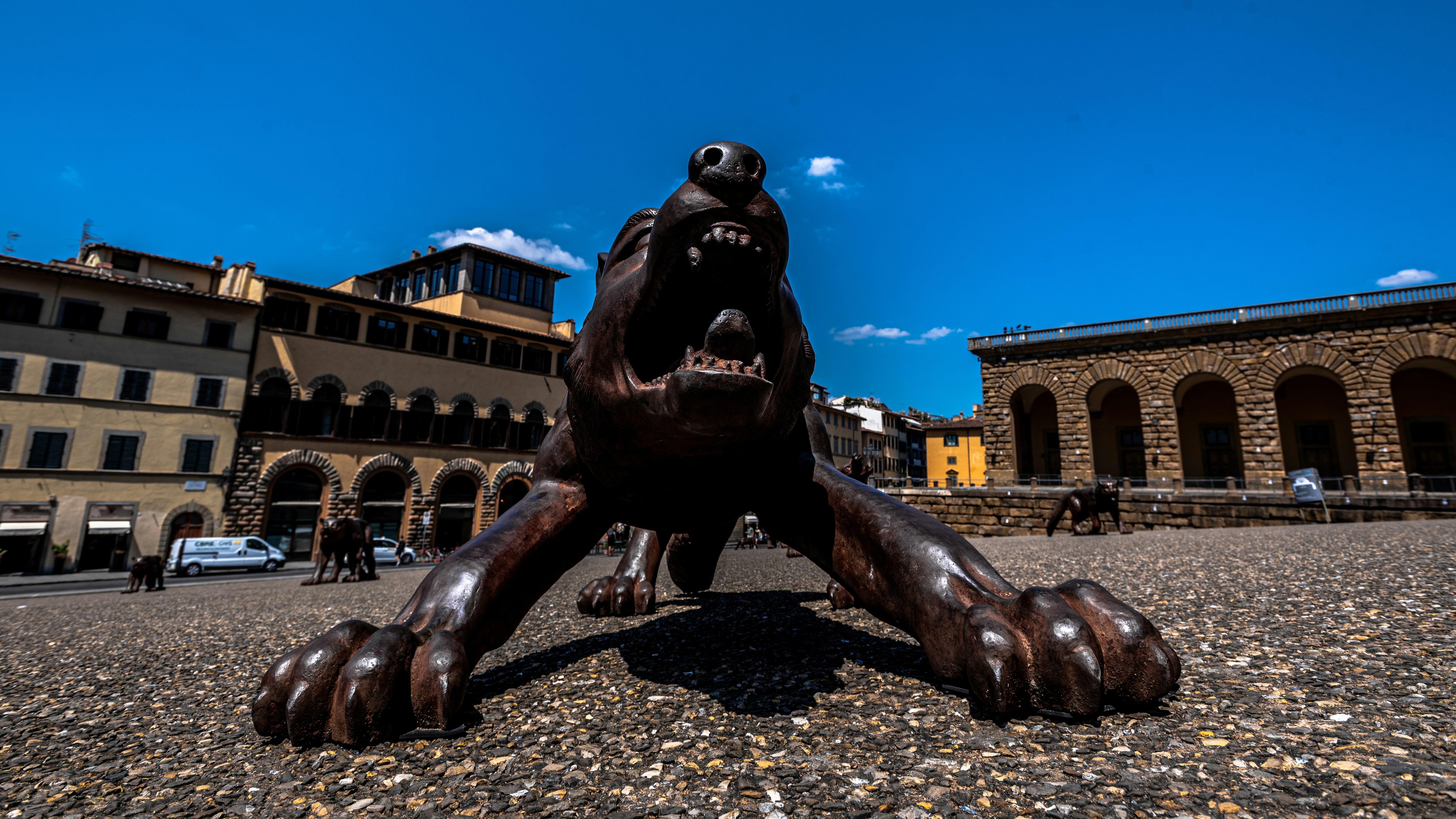 black horse statue on brown soil during daytime