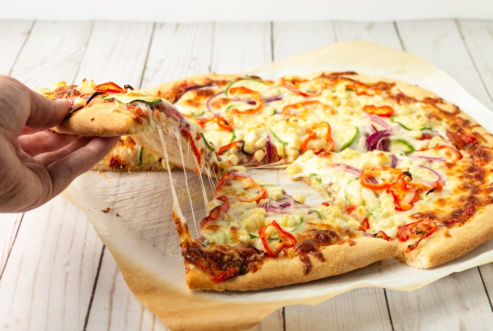 pizza on brown wooden table