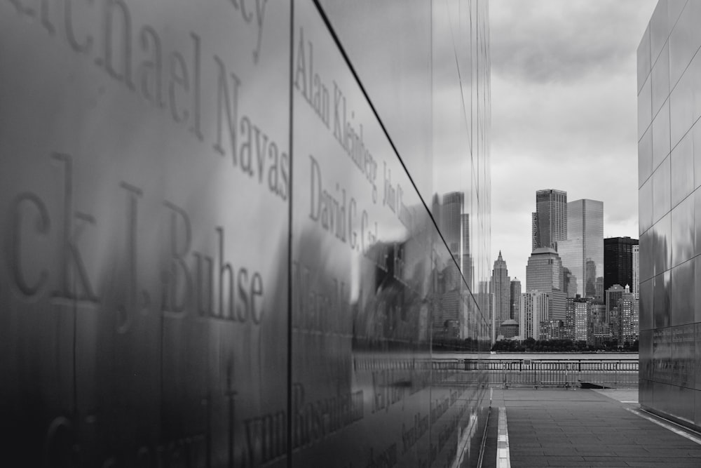 grayscale photo of city buildings