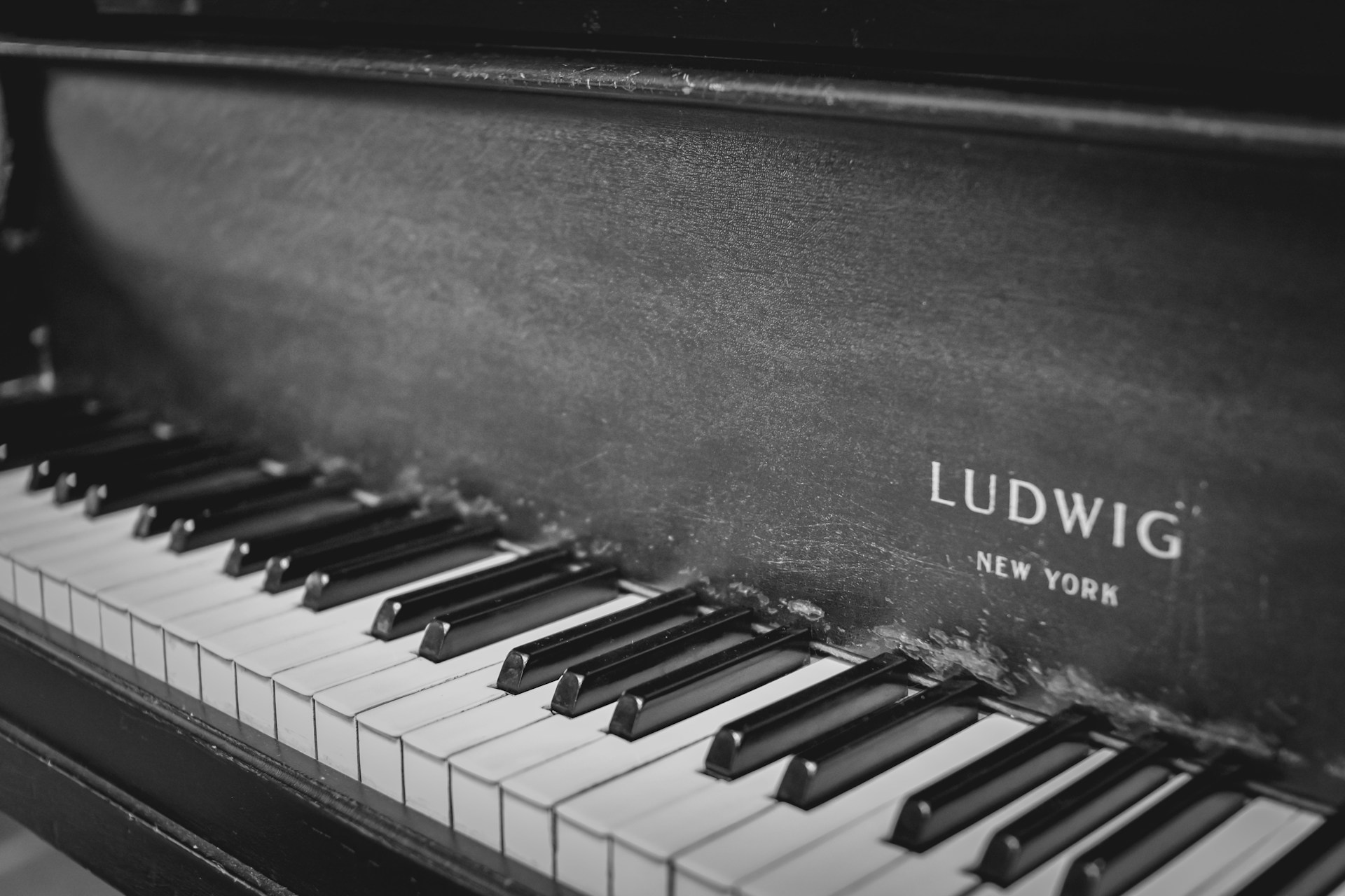 grayscale photo of piano keys