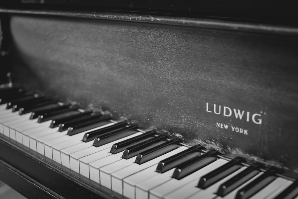 grayscale photo of piano keys